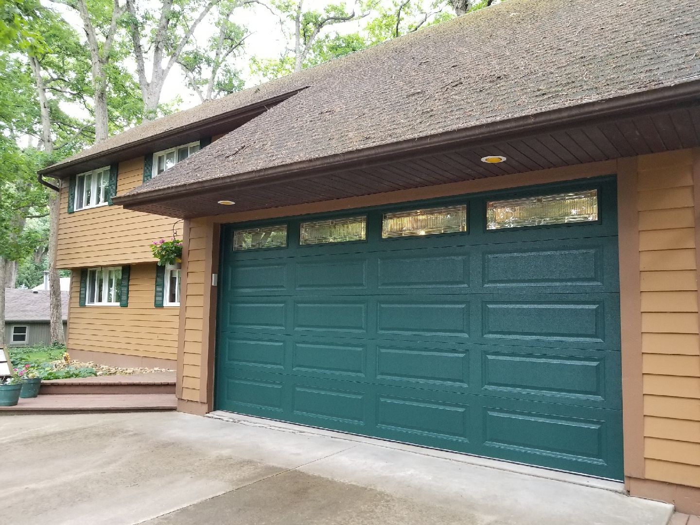 Hunter Green Color Option with Designer Glass Windows Residential